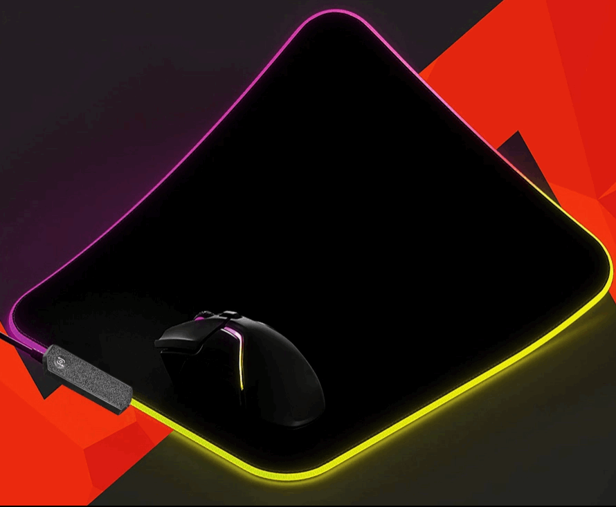 "Glide in Style: Level Up Your Play with Our Colorful RGB Mouse Pad Magic!"